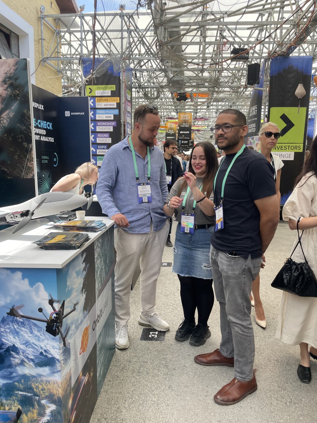 Visitors at the OrbitUAV booth, Doers United 2025